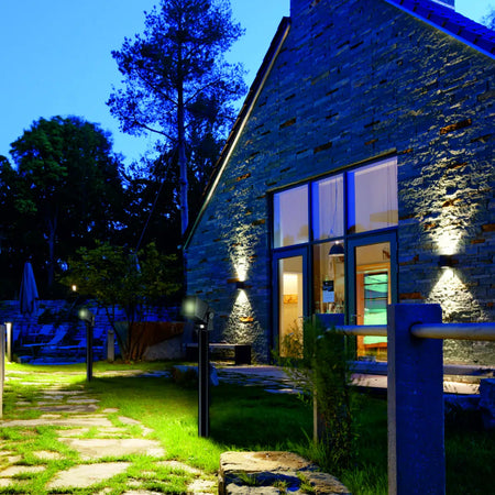 EST-D700109A LED spotlight illuminating a garden pathway