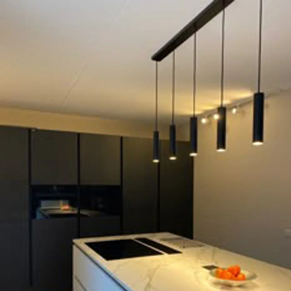 The FS3040A‑10 pendant spot light in matte black, with its minimalist design and precise beam focus