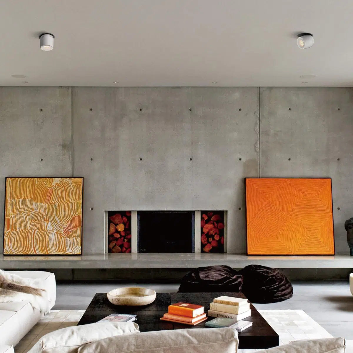LED surface-mounted pendant light with a warm white color temperature illuminating a stylish dining area, showcasing its ability to create a cozy and inviting atmosphere and recessed ceiling lights.